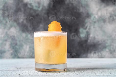 Glass of whiskey sour 5462992 Stock Photo at Vecteezy