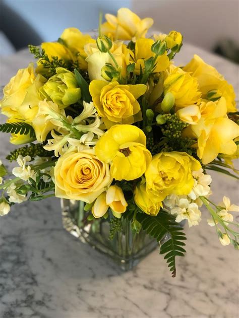 Yellow floral arrangement by Stem Floral Design - Easy flowers | Flower ...