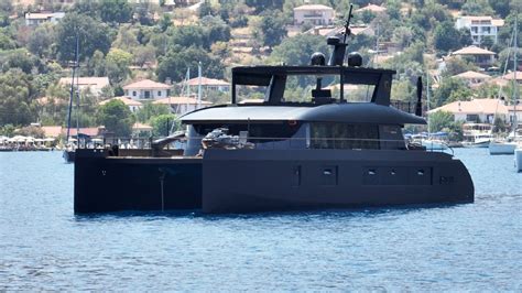 This Matte-Black, Solar-Powered Catamaran Is Designed to Soak Up ...