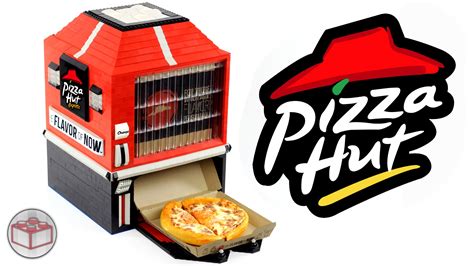 A LEGO Machine That Dispenses Personal Pan Pizzas and Change After Users Insert Five Dollars