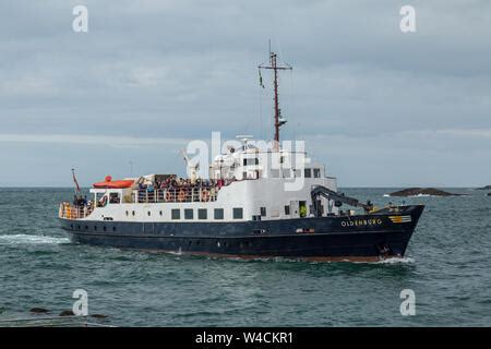 The MS Oldenburg, the Lundy island ferry, berthed on lundy island, with passengers, North Devon ...