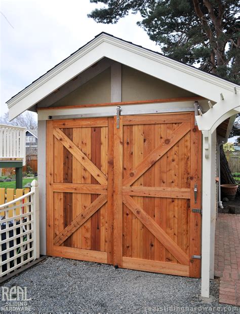 Large barn doors on an outdoor shed (right door slides over fixed door). | Exterior barn doors ...