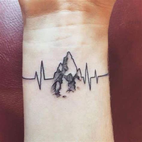 Popularly known as the EKG line tattoo, the pulse symbol is similar to a little monitor with an ...