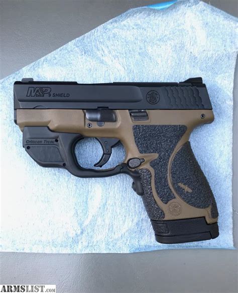 ARMSLIST - For Sale: CUSTOM M&P SHIELD 9mm with GREEN CRIMSON TRACE LASER