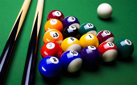 Two beige-and-black cue sticks and pool ball set, billiard balls, pool ...