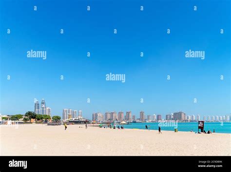 Katara Beach looking towards the skyline of The Pearl Qatar development ...