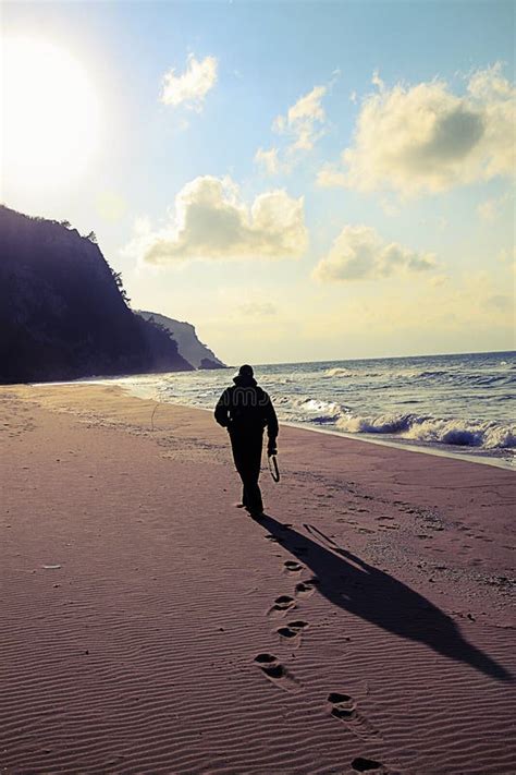 Man Walking Alone On The Beach. Beach Travel At Summer Time Stock Photo ...