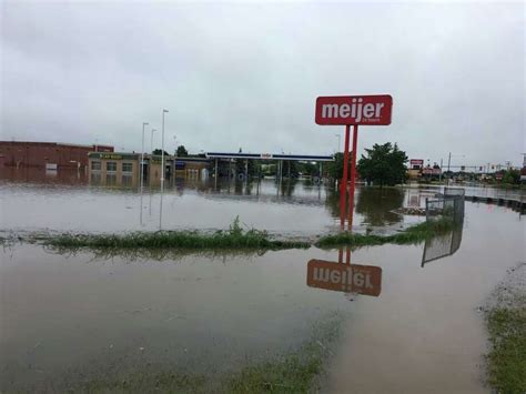 Flooding prompts Michigan to launch Emergency Operations Center ...