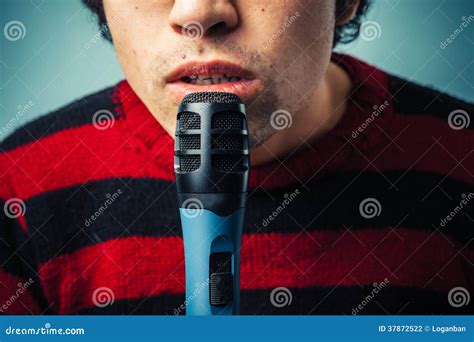 Speak into the microphone stock photo. Image of color - 37872522