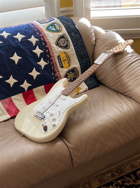 Hip hop artist singer rapper Post Malone donates signed Fender Squier electric guitar to help ...