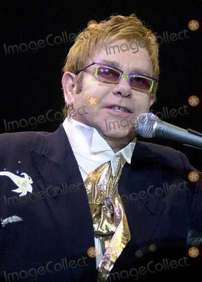 Photos and Pictures - SHEFFIELD, DECEMBER 9, 2004 Elton John live in concert during his Peach ...