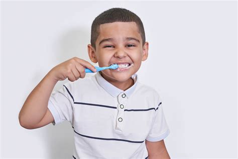 Teeth Brushing in Kids: Dentist Tips for Parents - Express Dentist