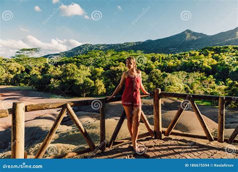 Attractive Woman at Seven Coloured Earths in Chamarel National Park, Mauritius Stock Photo ...