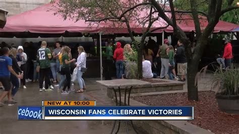 Wisconsin fans celebrate winning weekend