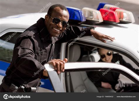 Happy Young Police Officers Car Looking Camera ⬇ Stock Photo, Image by ...