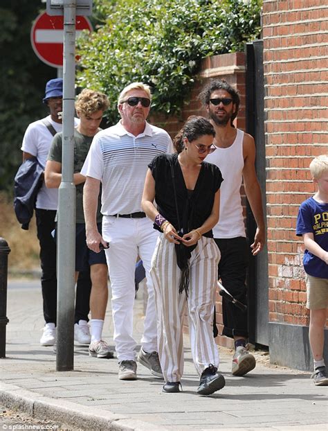 Boris Becker enjoys a walk with his children... as estranged wife Lilly 'prepares to move out ...