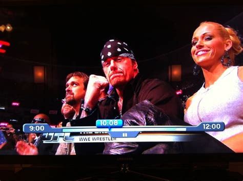 Undertaker and Michelle McCool at UFC - The Undertaker and Michelle ...