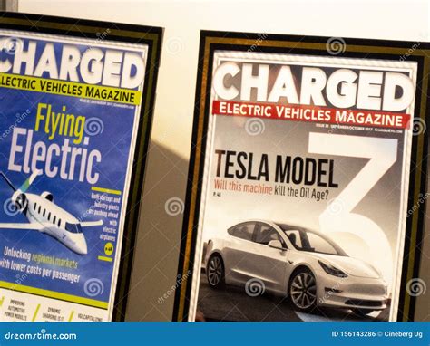 Charged Electric Vehicles Magazine Editorial Photo - Image of cultural, book: 156143286