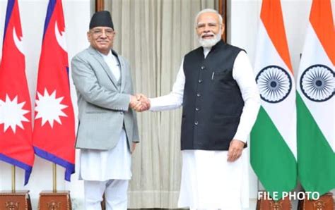 Prime Minister Narendra Modi speaks with Prime Minister of Nepal