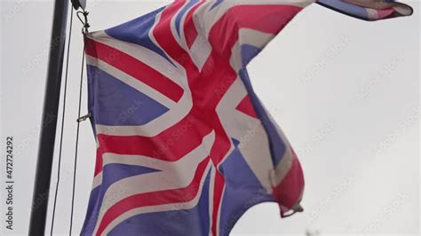 National flag of the UK waving in the wind. Stock Video | Adobe Stock