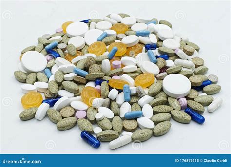 A Lot of Colored Pharmaceutical Pills Isolated on White. Stock Image ...