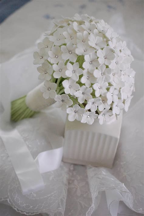 Stephanotis wedding bouquet for a bride in UK | Handmade PaPer FloweRs by Maria Noble