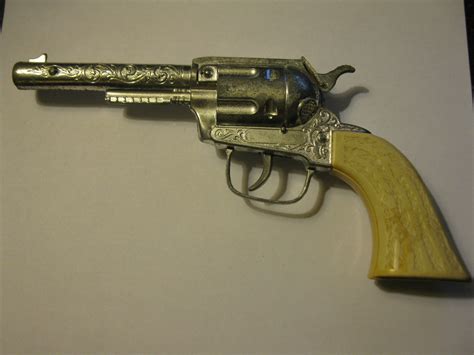 (CG -1) Vintage Toy Cap Gun: Unknown Pistol w/ White grips - Diecast