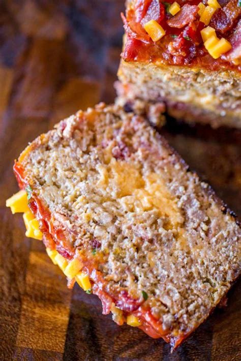 Bacon Cheeseburger Meatloaf topped and stuffed with cheddar cheese and ...