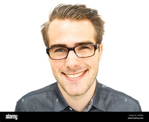 Smiling young businessman wearing glasses, portrait Stock Photo - Alamy