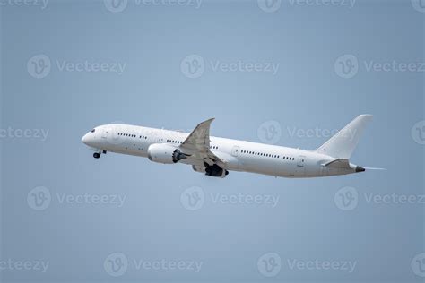 A commercial airplane taking off at an airport. 7448778 Stock Photo at ...