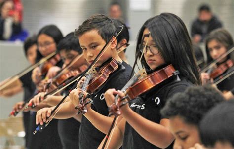 District postpones removal of middle school orchestra program – The ...