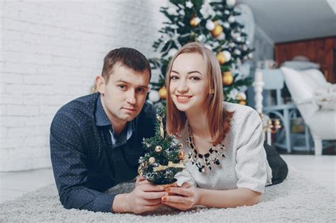 Free Photo | Couple near christmas tree