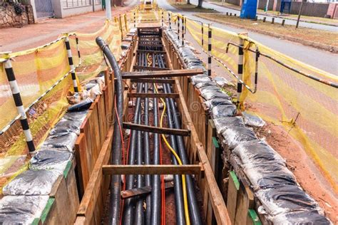 Electricity New Cables Installation Trenches Stock Image - Image of contractors, closeup: 101348113