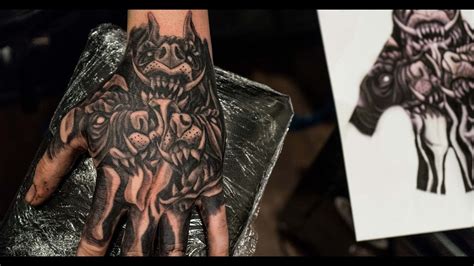 Cerberus Hand Tattoo by Raphganistan Dagenham Essex | Hand tattoos ...