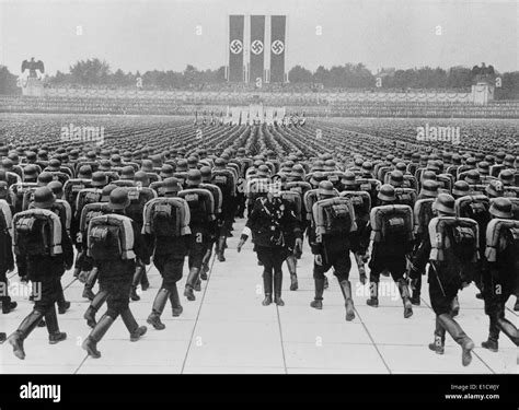 Members of the SS marching in formation on Nazi Party Day, Nuremberg. Germany, September 1937 ...