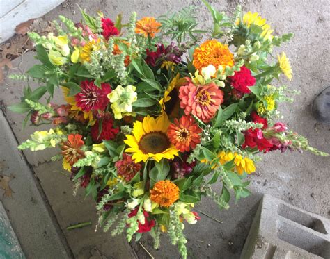 Mixed flower bouquets with locally grown sunflowers, zinnias, snap ...