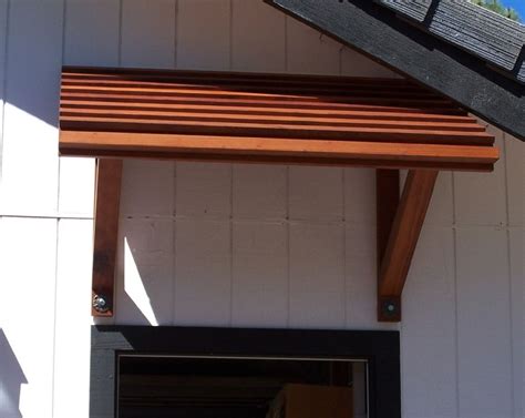 Wood Awning For Front Door | Porch awning, Window awnings, Wood railing