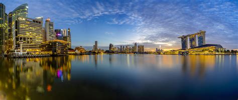 Panorama of 3 pictures of Singapore beautiful skyline and bay shot on a ...