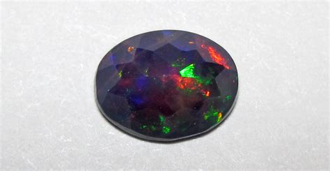 Black opal (Stayish Mine, Wollo Province, Ethiopia) 8 | Flickr