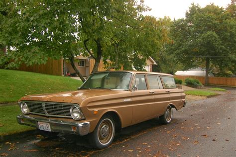 OLD PARKED CARS.: 1965 Ford Falcon Wagon.