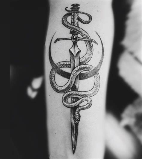 Snake On Sword Tattoo