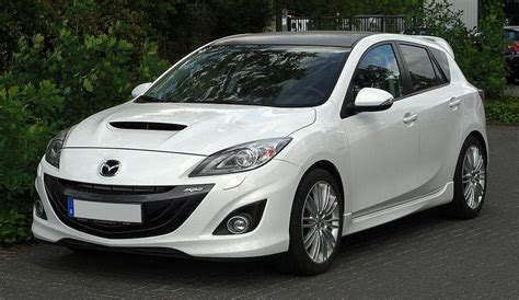 2009 Mazda Mazda3 3 s Touring 4dr Hatchback 5-spd manual w/OD