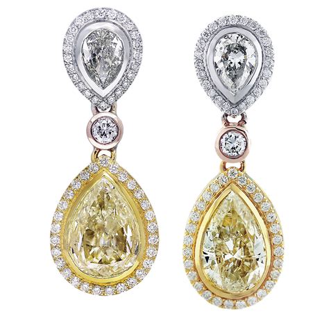 pear shape diamond earrings - Raymond Lee Jewelers