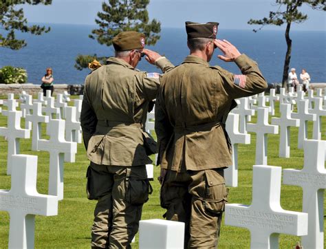 grave-markers-at-normandy-american-cemetery - D-Day Pictures - World War II - HISTORY.com