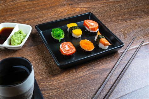 Sushi with chopsticks 1827268 Stock Photo at Vecteezy