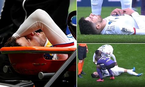 Lyon players are left shaken as Martin Terrier is carried off after ...