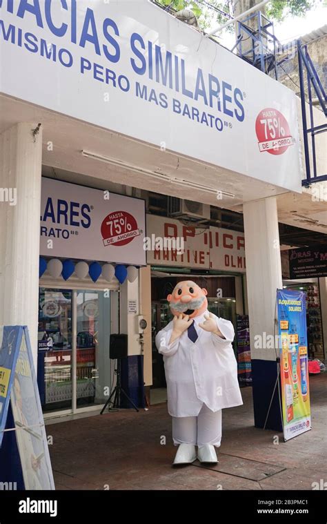 Pharmacist in Dr. Simi costume dancing outside of Farmacias Similares, Similares Pharmacy ...