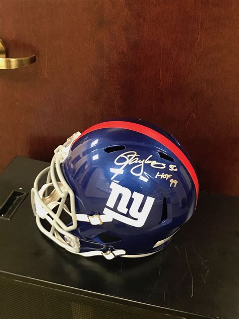 Charitybuzz: New York Giants Replica Helmet Signed by Hall of Famer La... - Lot 1933704