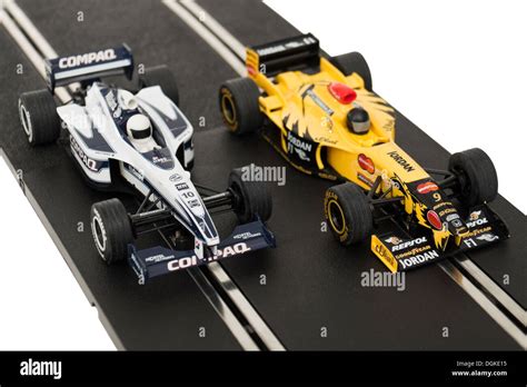 Pair of Scalextric Formula 1 analogue slot cars Stock Photo - Alamy