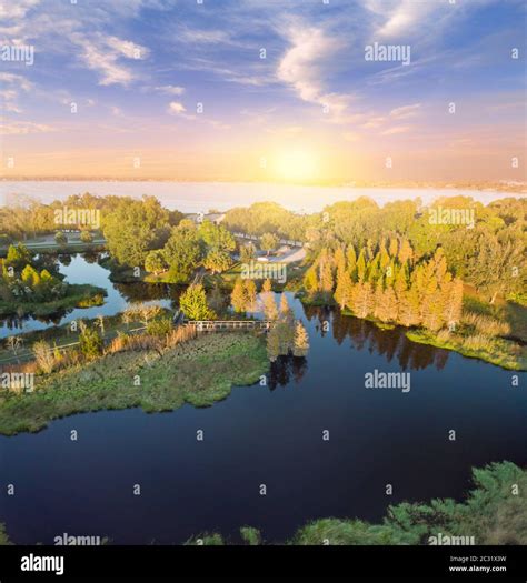 Small Park in Florida wetlands at sunset. Aerial view Stock Photo - Alamy